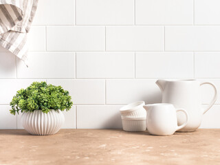Naklejka na ściany i meble Stylish white kitchen background with kitchen utensils, copy space for text