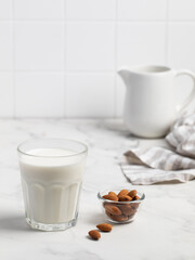 Fototapeta na wymiar Almonds, a glass of milk. lactose free milk. Healthy food. Almond milk.