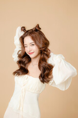 Young Asian beauty woman curly long hair with korean makeup style on cute face and perfect skin on...