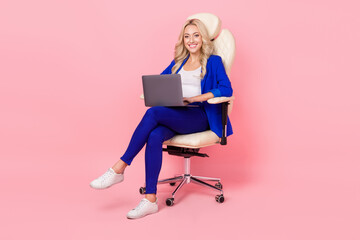Full body photo of professional lady sitting comfy office chair use modern technology apple macbook...