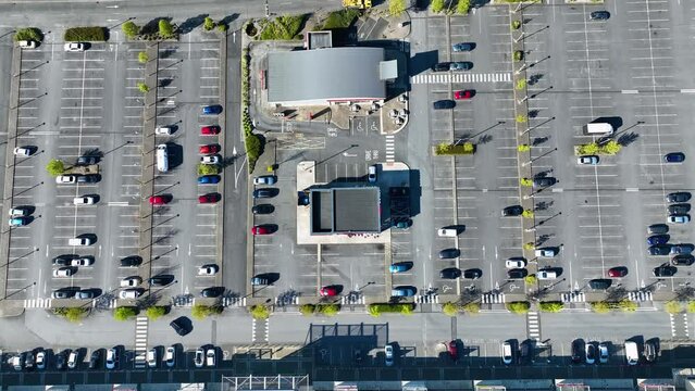 Large parking area with the free parking spaces near the supermarket 4k