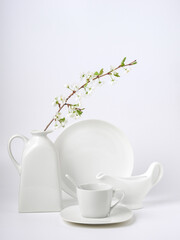 Modern summer still life. a white vase with long shadows.white background of the wall table. Empty space for copying. An elegant lifestyle in the Mediterranean style.