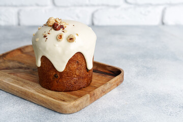 Traditional Easter cake with nuts on gray background
