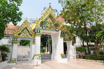 That thong temple's main gate. Made from glass and cement.