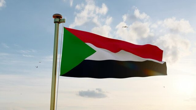 Flag of SUDAN waving in the wind, sky and sun background. Sudan Flag Video. ULTRA HD.