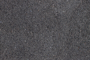 asphalt. damaged asphalt. asphalt with small stones.