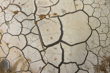 cracked paint. damaged paint. burnt paint. rust.