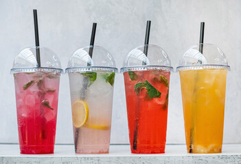 summer lemonades in the plastic cups