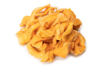 Dried melon slices isolated on a white background.