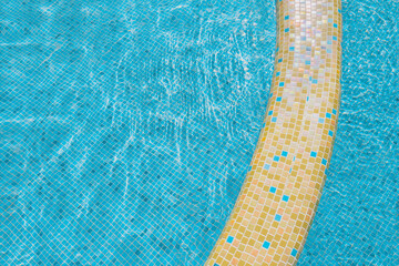 Travel abstract hotel background blue water surface. Ripple water abstract pool background vacation resort travel background resort design pool resort swimming pool mosaic tile pool border tile square