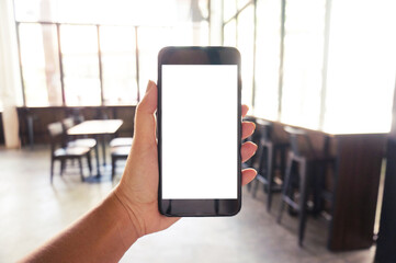 Close up of women's hands holding cell telephone blank copy space screen. smart phone with technology concept