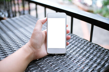 Close up of women's hands holding cell telephone blank copy space screen. smart phone with technology concept