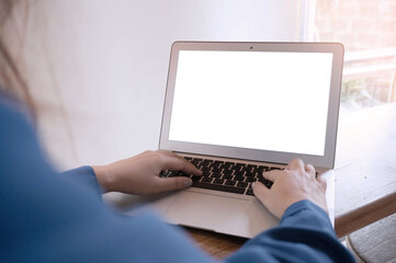 View of Details of business man hands typing on keyboard with blank screen