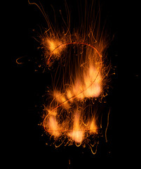 number two, fire in dark. luminous lines of sparks. explosion black powder.