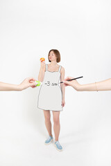 Weight loss concept. Young attractive and slender woman eating apple isolated on white background....