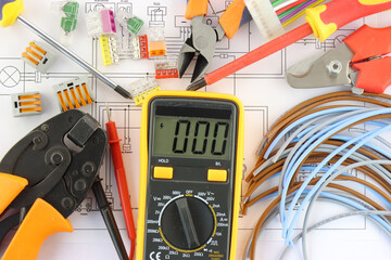 Electrical tools and materials for the installation of an electric panel in close-up.