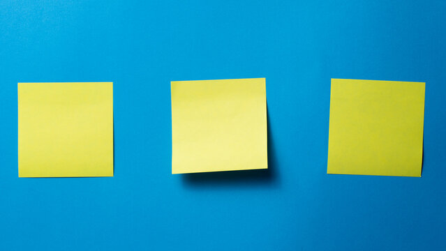 Blank Sticky Notes on Blue Background