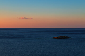 Obraz premium Beautiful landscape. Coast of the island of Crete - Greece area of Lerapetra Eden Rock. Beautiful sky at sunrise over the sea.