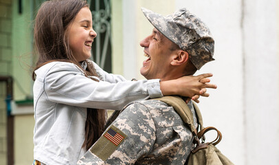 Soldier reunited with his daughter.
