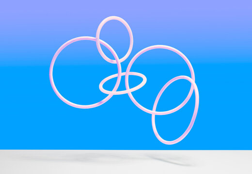 5 variously sized interlocking white rings in mid air