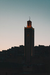 Mosque Rcif minaret in Fez. Morocco Fes at sunset goldhour
