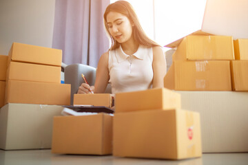 Many parcel boxes are prepared and inspected before calling shipping company to pick up parcel for delivery. entrepreneurs SMEs have prepared parcel boxes for delivery after receiving orders