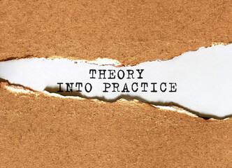 Text Theory into Practice appearing behind torn brown paper