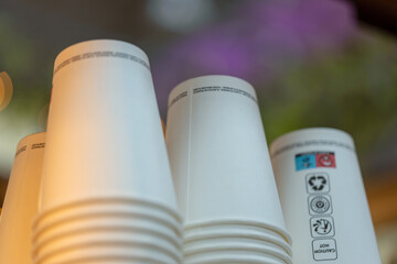 Disposable coffee cups. Garbage. Sustainable world. - obrazy, fototapety, plakaty