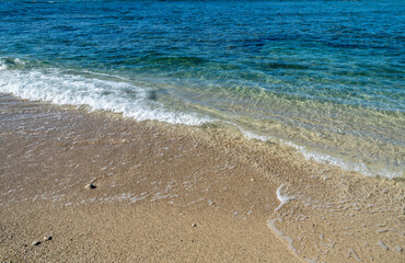 Waves Flowing onto a Sand Beach in Hawaii.
