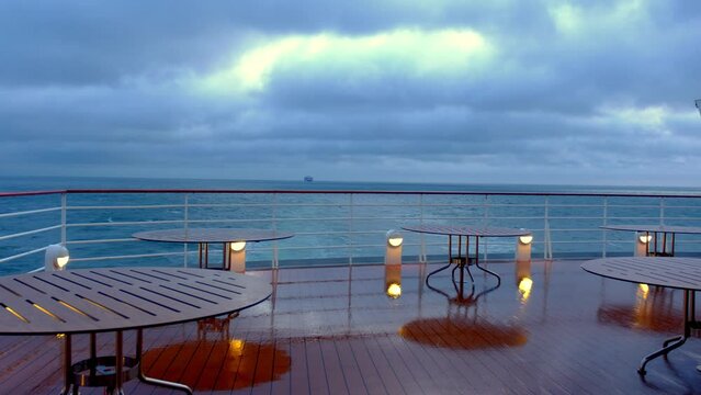 View of the bar at the open deck of the cruise ship at the early morning
