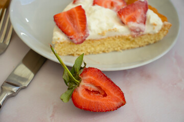 Pie with fresh strawberries on old background