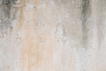 Concrete wall texture with cracks and scratches. Yellow and grey graphic materials	