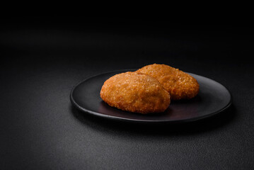 Delicious baked cutlet breaded with spices, salt and herbs