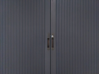 Zoom of black roller door cabinet with lock