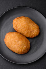 Delicious baked cutlet breaded with spices, salt and herbs