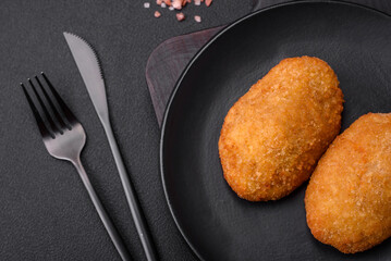 Delicious baked cutlet breaded with spices, salt and herbs