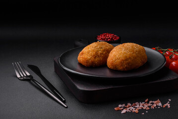 Delicious baked cutlet breaded with spices, salt and herbs