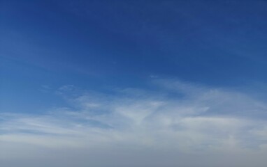 Blue sky white clouds. Bright day in Summer.