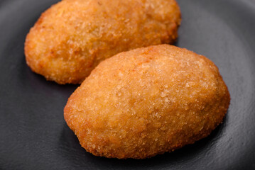 Delicious baked cutlet breaded with spices, salt and herbs
