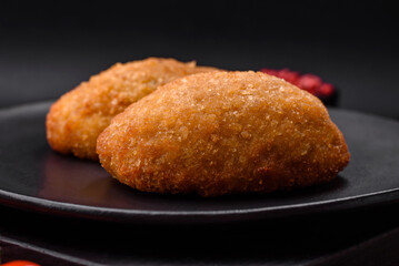 Delicious baked cutlet breaded with spices, salt and herbs