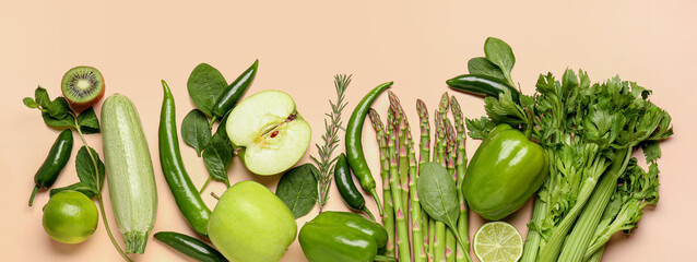 Many fresh vegetables and fruits on beige background