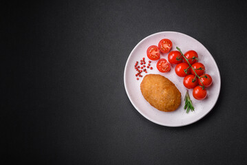 Delicious baked cutlet breaded with spices, salt and herbs