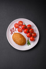 Delicious baked cutlet breaded with spices, salt and herbs