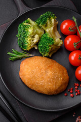 Delicious baked cutlet breaded with spices, salt and herbs