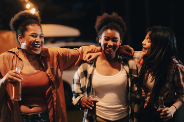 happy young woman friends person having fun to dance in bar-b-q food night party, camp fire...