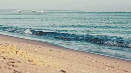 Baltic Sea Calm Waves Breaking at the Shore on Sunny Day