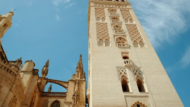 Seville Cathedral and Giralda, Seville, Andalusia, Spain, a majestic Gothic cathedral with the iconic bell tower showcasing rich history and art