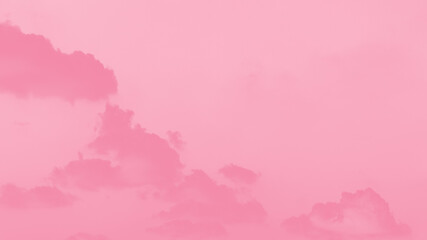 Pink clouds on light pink sky background, pastel sky