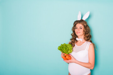 young attractive pregnant girl in a bunny suit