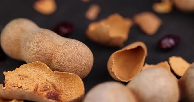 fresh tamarind fruit while cooking, close-up of tamarind in the kitchen